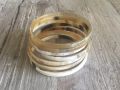 Armbanden buffelhoorn 7 st., Hoogte 5mm, glans finish. Superlicht in gewicht.  S t/m L