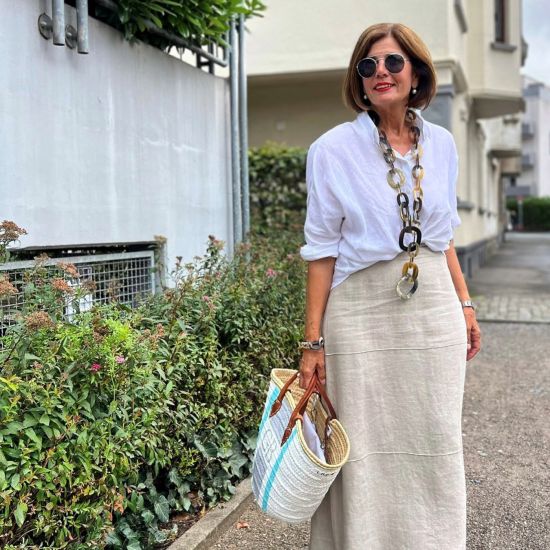 Stoere handgemaakte ketting buffelhoorn. Matte finish, lichtgewicht. Bruintinten. Lengte 116cm.